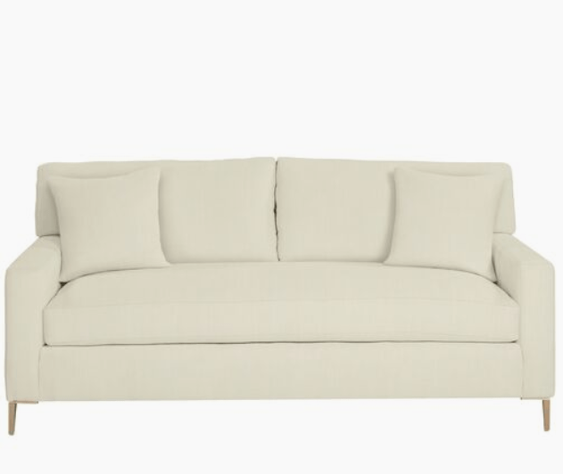 Exclusive to One Kings Lane: Defined by its crisp lines and brass leg design, this stylish sofa embodies a sleek, Scandinavian-inspired look