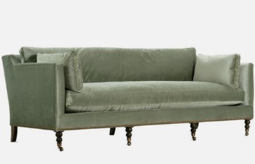 From its plush luxe velvet upholstery, boxy track arms to its turned front legs, this sofa is the ultimate in timeless elegance and sophistication. And thanks to its ample feather-and-down cushioning, it welcomes guests with long-lasting comfort and support.